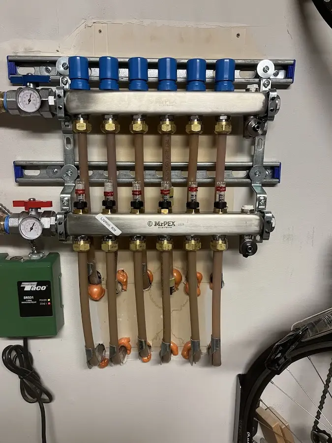 Plumber performing Water Heater Repair at a residential property in Upper Mount Bethel